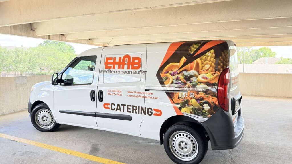 Side of a catering van wrap with food photos for Ehab Mediterranean Buffet in Houston